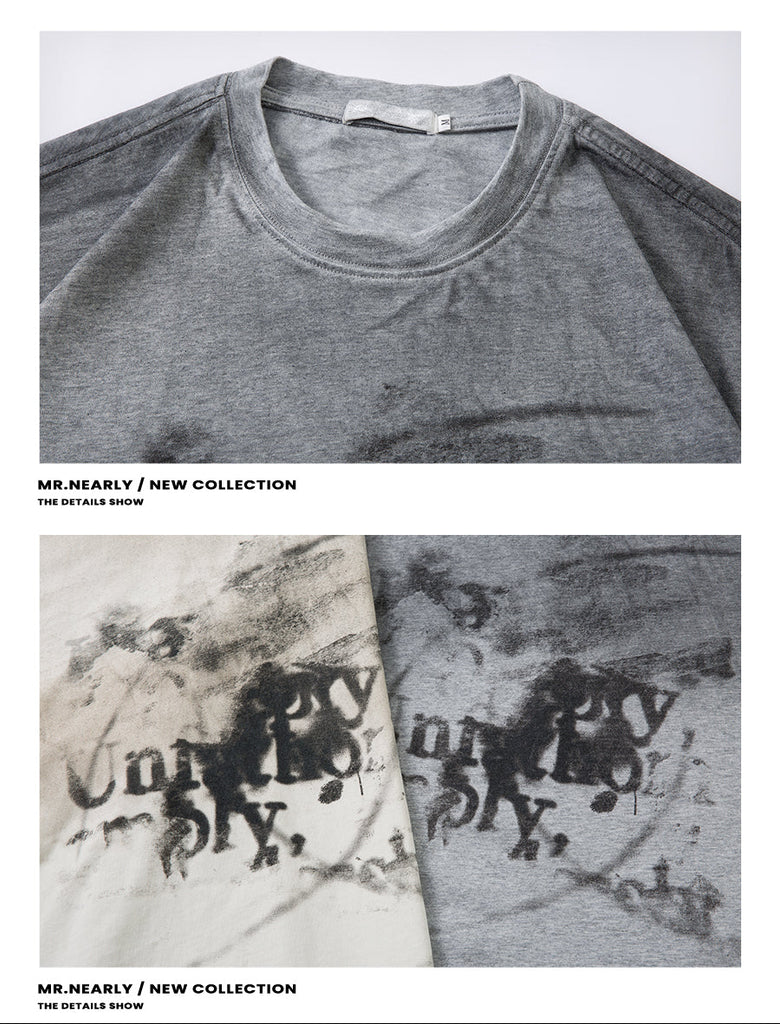 Gray t-shirt with text design on a white background