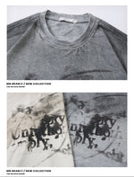 Gray t-shirt with text design on a white background
