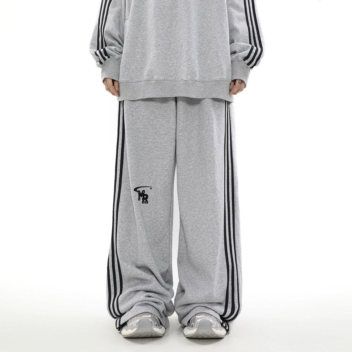 Wide legged tracksuit sales bottoms